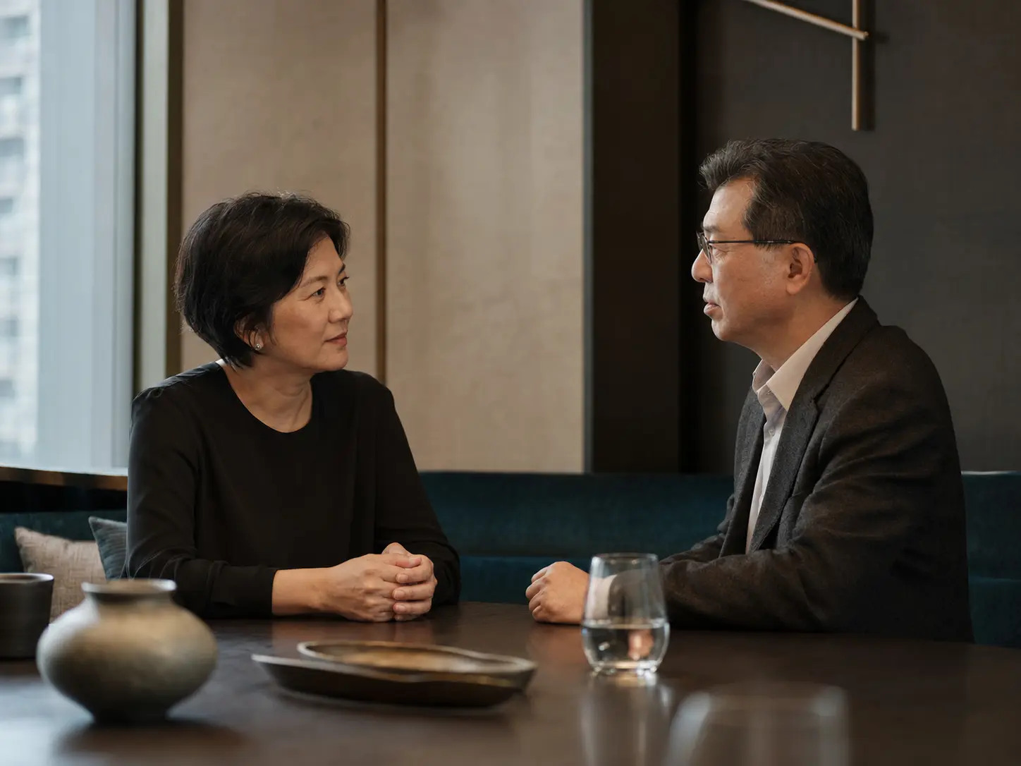 Two senior leaders in a trusting conversation